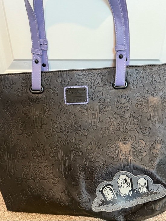 Disney Handbags - Disney Haunted Mansion Black Embossed Loungefly Backpack with Light Purple Trim